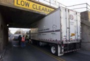 Carnage Video: 13 Crashes in 13 Months as Trucks Smash Themselves Topless Under a Low Bridge